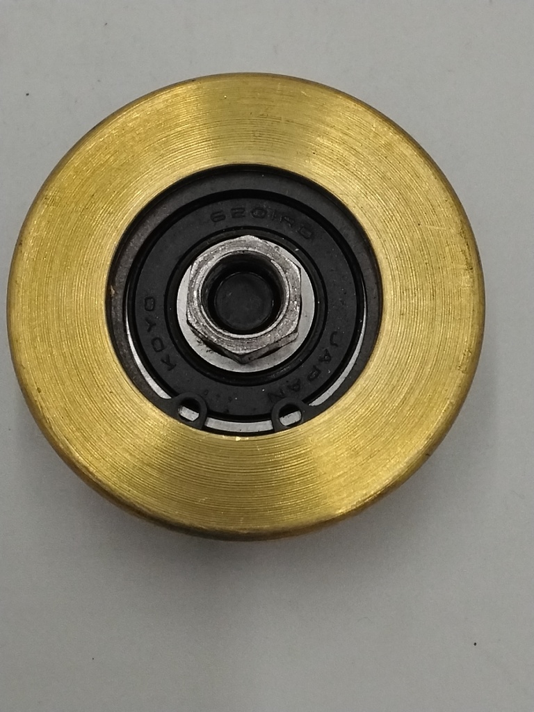 RUEDA EXCENTRICA DE PUERTA DE CABINA EN BRONCE DE 56MM (SIGLA PUDAHUEL)   